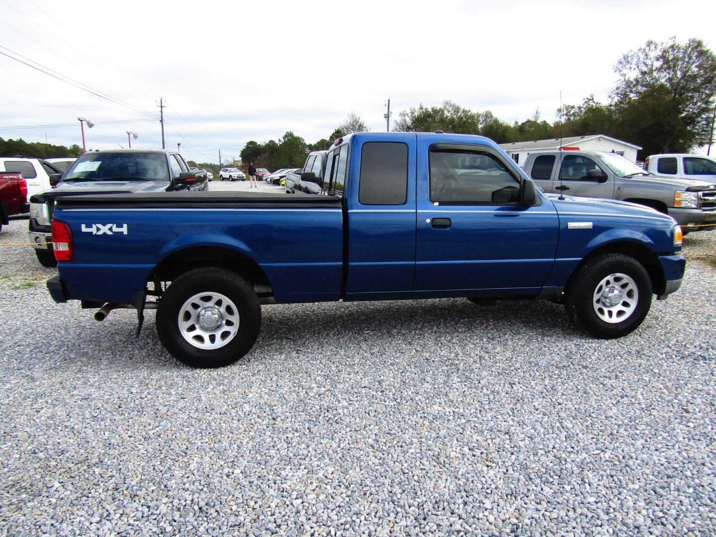 2010 Blue /Black Ford Ranger Sport SuperCab 4-Door 4WD (1FTLR4FE6AP) with an 4.0L V6 SOHC 12V engine, Automatic transmission, located at 15016 S Hwy 231, Midland City, AL, 36350, (334) 983-3001, 31.306210, -85.495277 - Photo#7